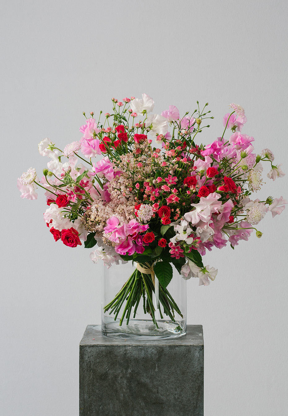 flower bouquet of rose and sweet peas by flannel flowers