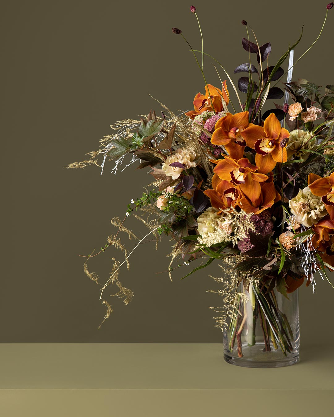 Banner image of flower bouquet of golden orchids for the online flower collection